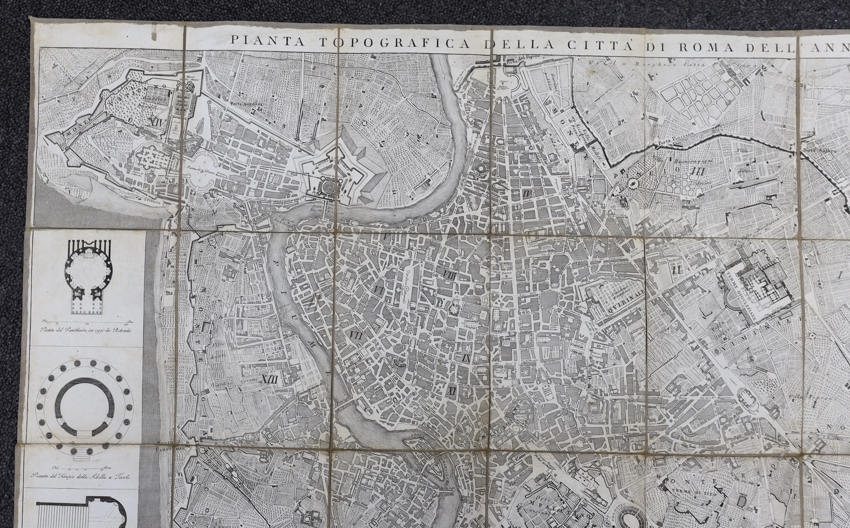 (Rome) Pianta Topgrafica dela Citta di Roma ... folded large scale plan, dissected and mounted on linen, engraved plans in surrounds, opens to approx. 44 x 82cms; some individual buildings and streets named, contained in